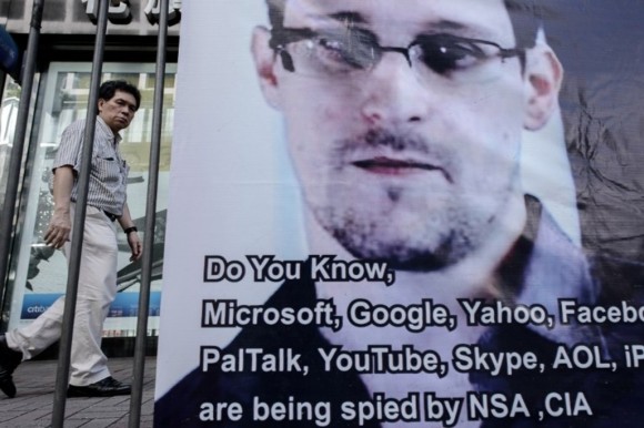 Edward-Snowden-renonce-a-demander-l-asile-en-Russie_article_popin