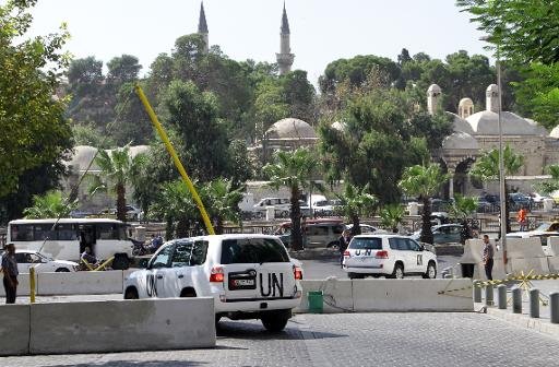 Un convoi de véhicules de l'ONU transportant des experts en armes chimiques à Damas le 29 Septembre 2013, pour enquêter sur l'utilisation présumée d'armes interdites.