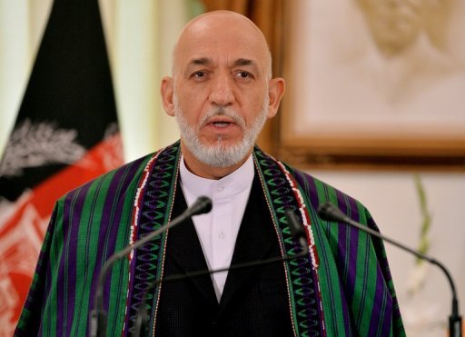 Le président afghan Hamid Karzai s'exprime lors d'une conférence de presse conjointe à Islamabad le 26 Août 2013. Les candidats qui cherchent à lui succéder doivent s'inscrire avant le 6 Octobre.