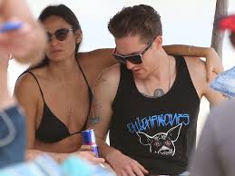 Demi Moore s'affiche avec Sean Friday (27ans) sur une plage au Mexique